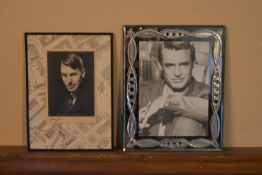A pair of framed photographic portraits, one of Cary Grant. H.31 W.24cm (largest) (2)