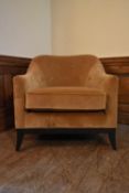 A contemporary tub armchair in buttoned velour upholstery. H.78 W.76 D.64cm