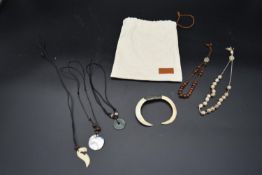 A Berlutti sack, various beaded necklaces and a bone bangle. L.40cm (longest necklace) (7)