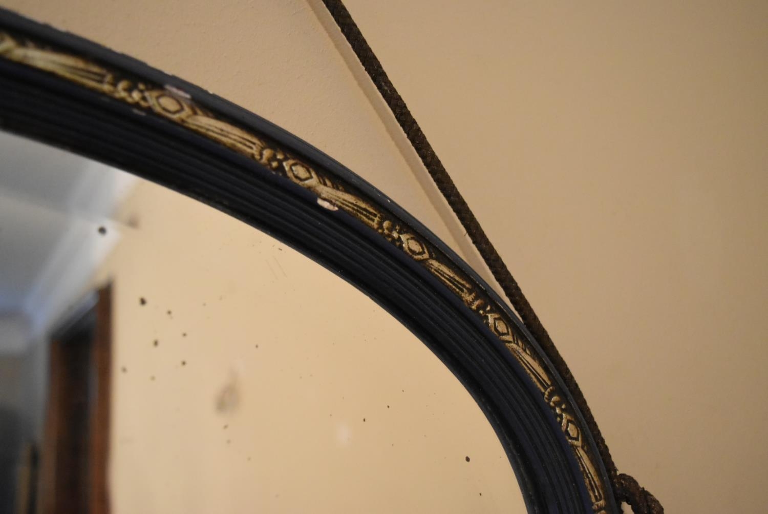A late 19th century oval carved hanging hall mirror with gilt edging and rope tassels. H.37 W.67cm - Image 3 of 6