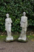 A pair of composite white painted garden statues of male and female Classical figures. H.60cm
