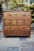 A 19th century camphor two part brass bound military chest with fitted secretaire section and