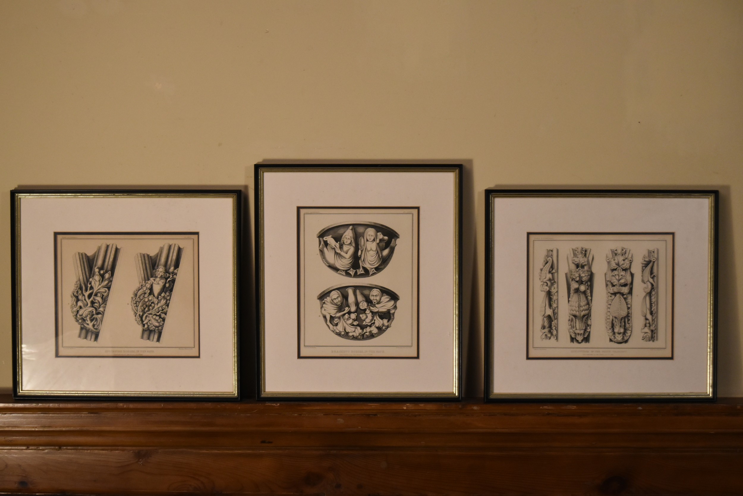 A set of three framed and glazed prints showing Gothic architectural carvings from York Cathedral,