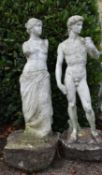 A pair of composite white painted garden statues of the Venus de Milo and Michelangelo's David. H.