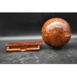 A burr maple domed and hinged top desk box with a burr maple sphere. H.4 W.27 D.15cm