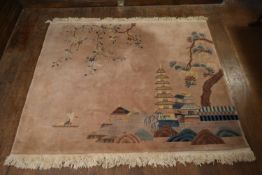 A Chinese rug with lake scape decoration on a blush ground. L.180 W.194cm