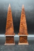 A pair of 20th century burr maple obelisks. H.46 W.12cm (2)