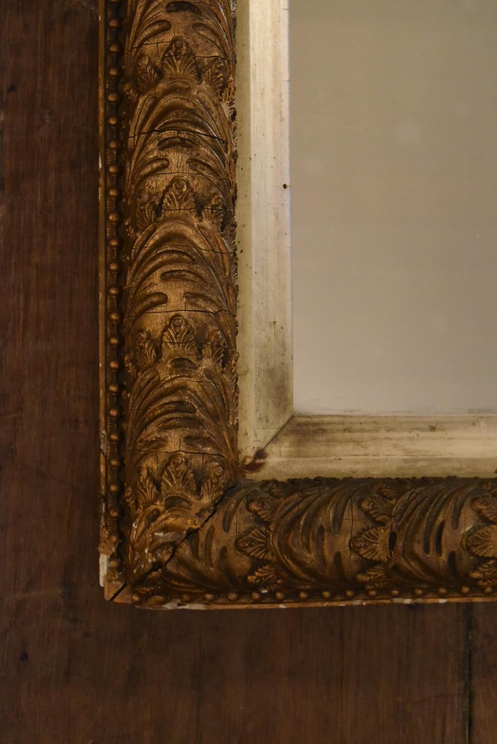 A 19th century gilt framed wall mirror with original plate in floral gesso decorated frame within - Image 2 of 4