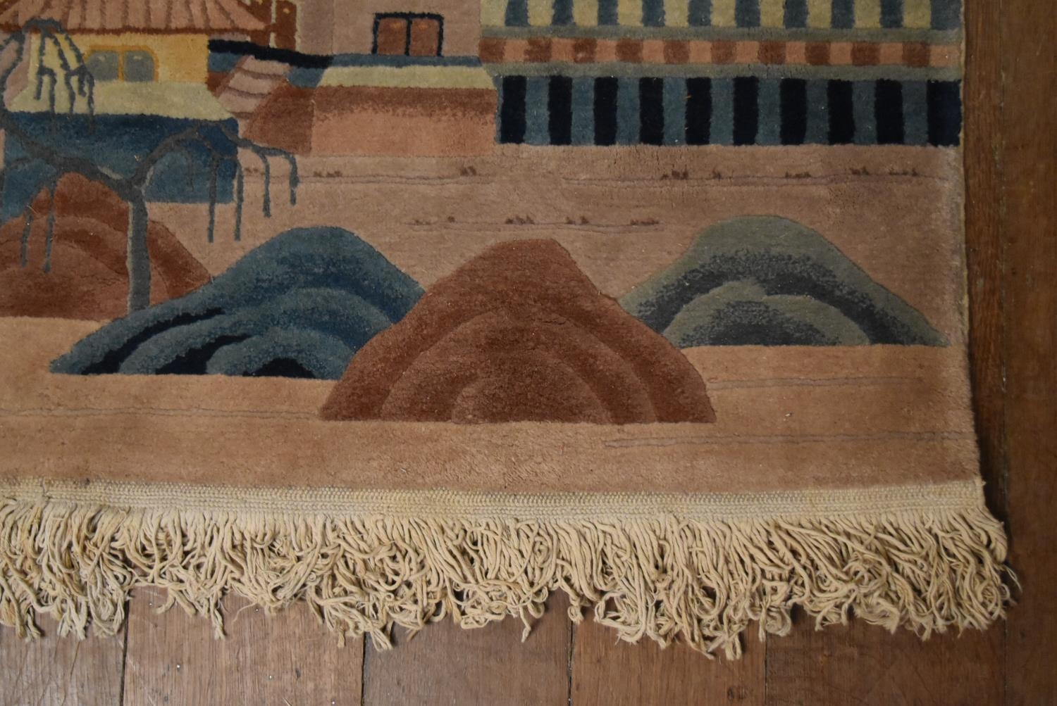 A Chinese rug with lake scape decoration on a blush ground. L.180 W.194cm - Image 4 of 6