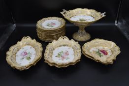 A 19th Century Ridgway porcelain dessert service hand painted with scalloped floral design including