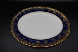 A large antique Wedgwood oval gilded stylised foliate design meat platter. Stamped Wedgwood. L.48