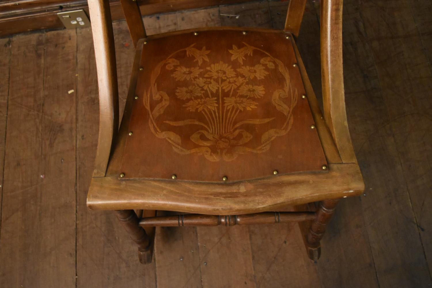 A late 19th century walnut rocking chair with floral pokerwork decorated back and seat. H.90 W.50 - Image 4 of 5