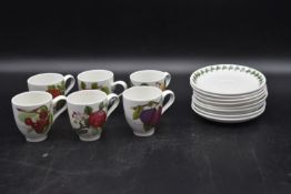 A set of six Portmeirion coffee cups with eight matching saucers with makers mark to base. H.7cm (