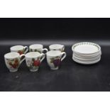 A set of six Portmeirion coffee cups with eight matching saucers with makers mark to base. H.7cm (