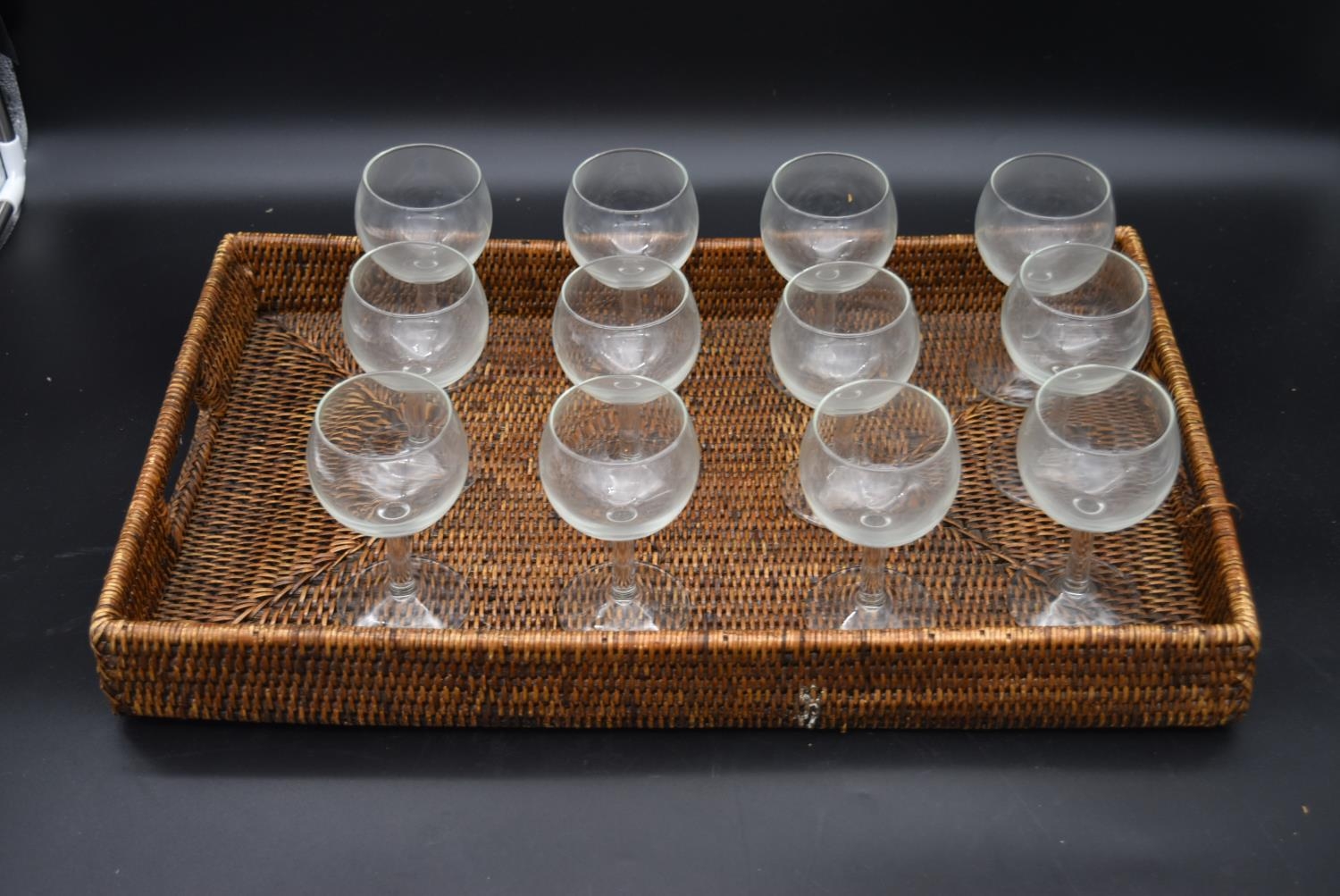 A wicker double ended magazine rack, a wicker tray and twelve balloon wine glasses. H.7 W.55 D. - Image 4 of 23