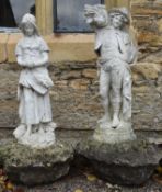 A pair of composite white painted garden statues of harvesters. H.102cm