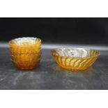 A set of seven vintage amber swirl depression glass fruit dessert bowls. H.7 Dia.20cm