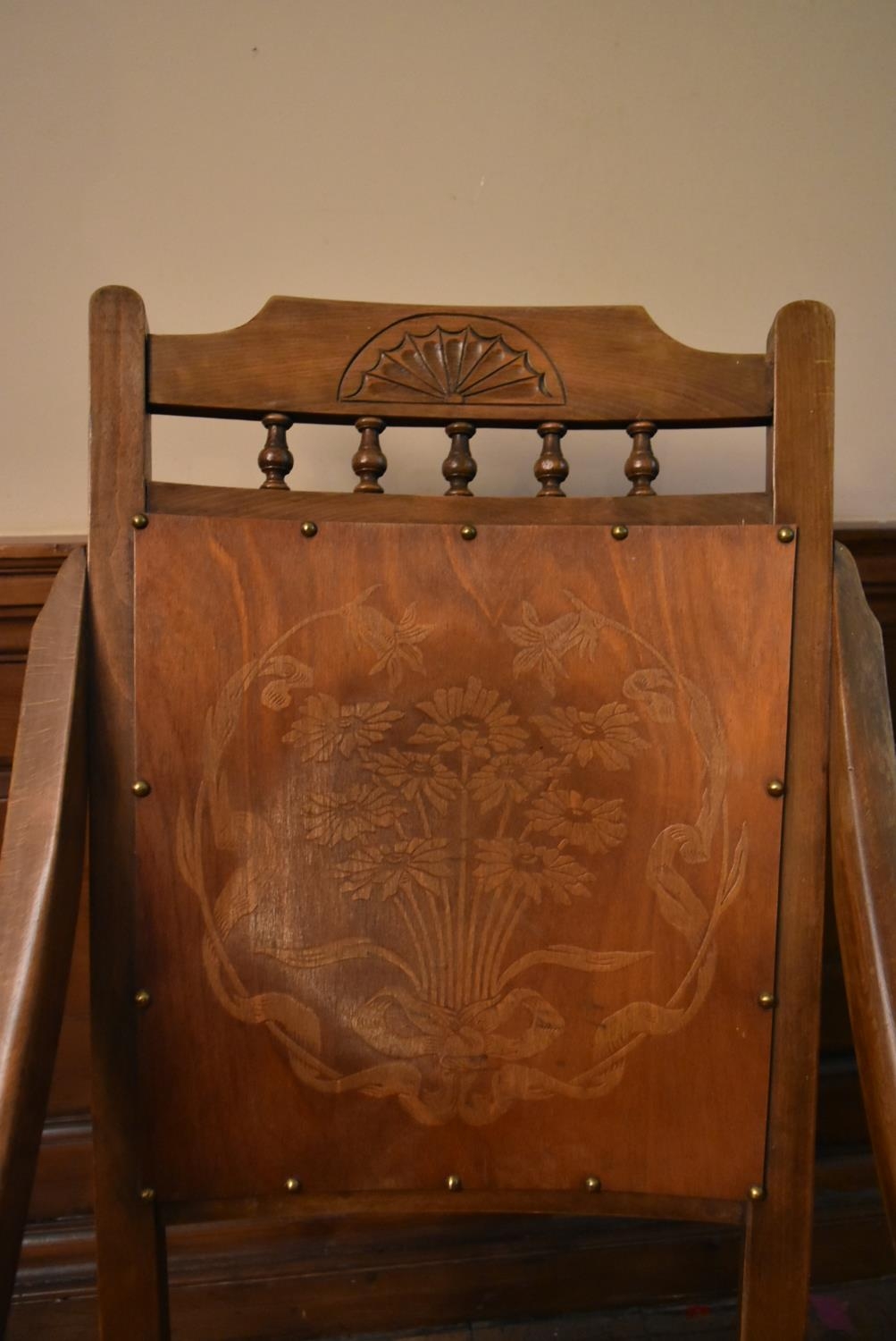 A late 19th century walnut rocking chair with floral pokerwork decorated back and seat. H.90 W.50 - Image 5 of 5