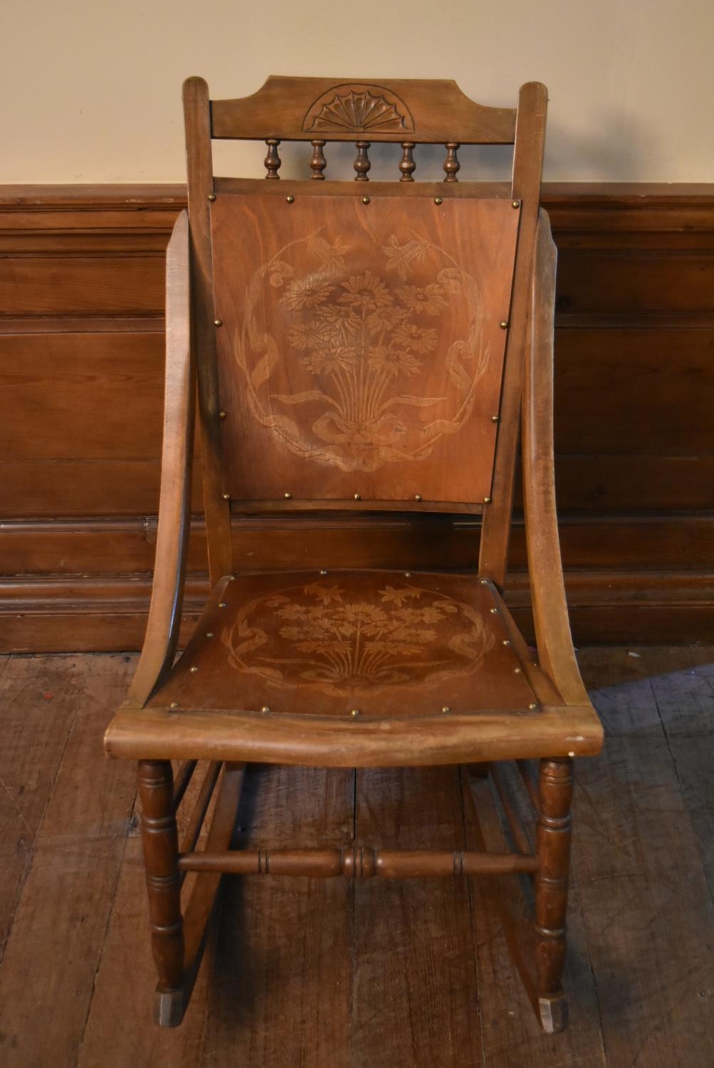 A late 19th century walnut rocking chair with floral pokerwork decorated back and seat. H.90 W.50 - Image 2 of 5