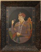 A framed and glazed early 20th century Indo-Persian watercolour on paper of King Shah Jahan was the