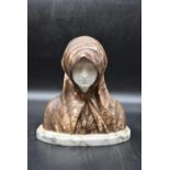 After Armando Barabino (1883-1870)- An Art Nouveau carved white marble bust of Madonna with a