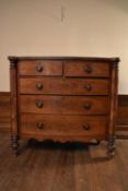 A mid Victorian mahogany bowfronted chest of two short above three long drawers flanked by
