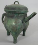 A Chinese bronze archaistic ritual pouring vessel, with character mark to the base. H.23cm