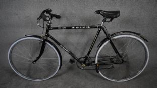 A vintage large gentleman's bicycle by Marvel. With 27" tyres and black painted frame with leather