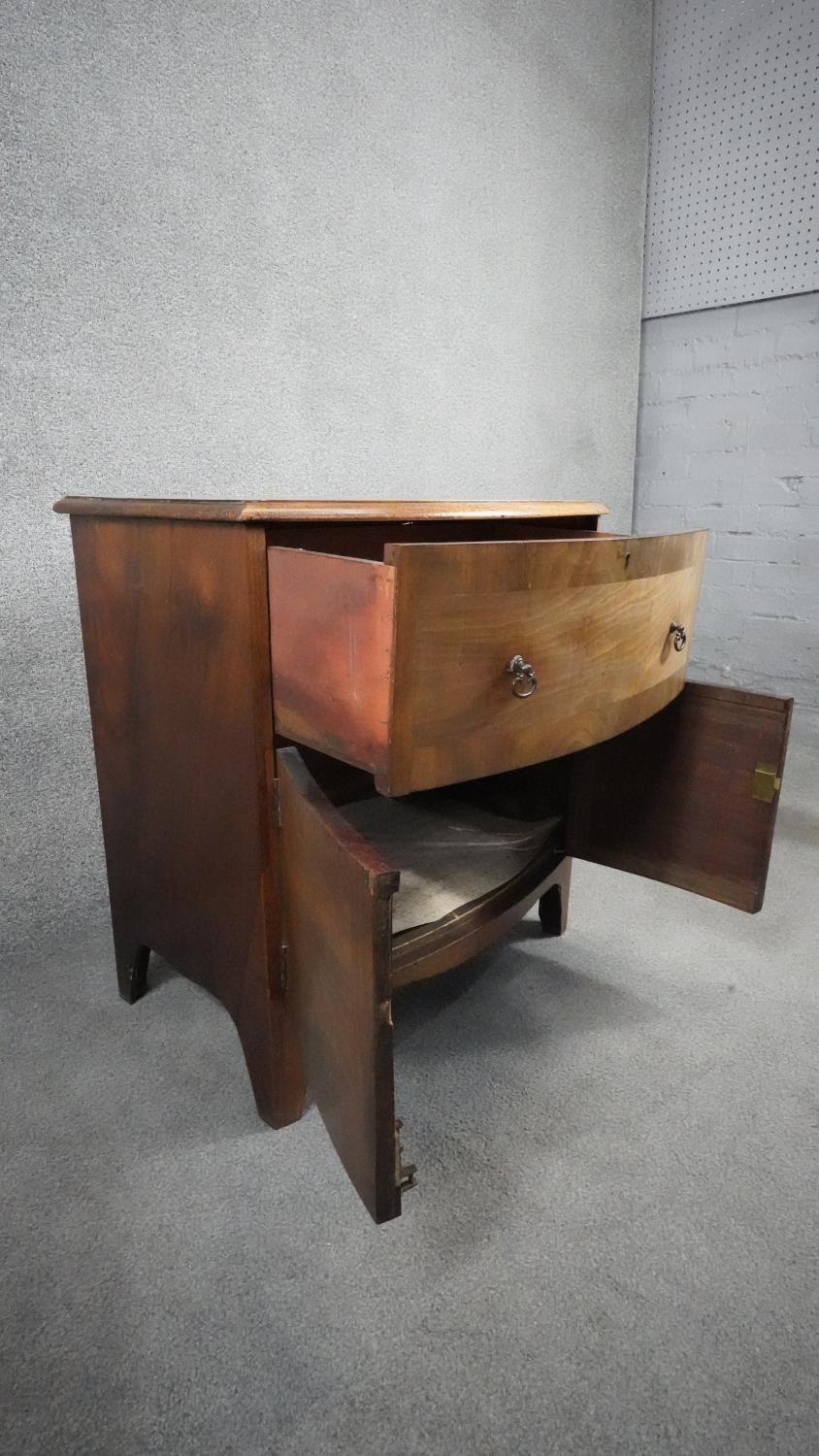 A Georgian mahogany and crossbanded bedside cabinet on shaped swept bracket feet. H.71 W.65 D.39 - Image 2 of 5