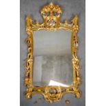 A Chinese Chippendale style pier mirror in carved giltwood frame. H.113 W.67