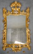 A Chinese Chippendale style pier mirror in carved giltwood frame. H.113 W.67