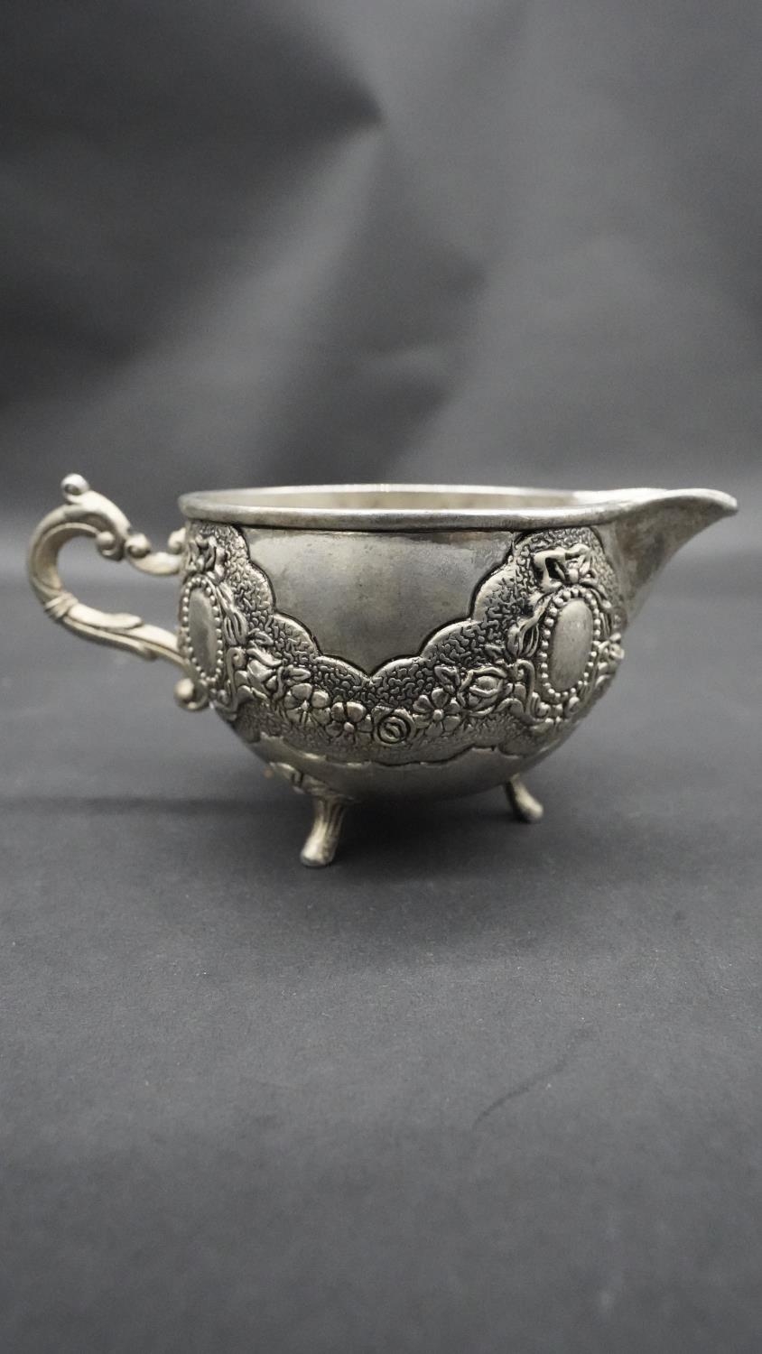 A silver plate relief swag and floral design three piece Islamic coffee set, with coffee jug, - Image 10 of 11