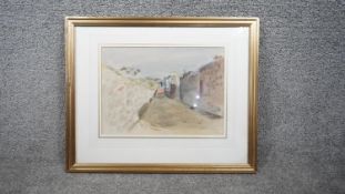 Geoffrey Clement Cowles (1894?1981) A framed and glazed watercolour of a village street scene.