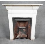 A late 19th century cast iron fire place and surround. H.105 W.97 D.30