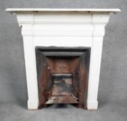 A late 19th century cast iron fire place and surround. H.105 W.97 D.30