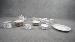 A Royal Crown Derby Brittany pattern part tea set. Including 8 saucers, 8 cake plates, 1 serving