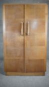 A mid century vintage oak fitted compactum wardrobe. H.152 W.92 D.46