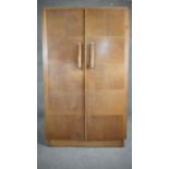 A mid century vintage oak fitted compactum wardrobe. H.152 W.92 D.46