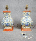 A pair of vintage hand painted ceramic Chinese vase design table lamps, stylised blue floral