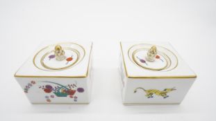 A pair of late 19th century Meissen porcelain 'yellow tiger' pattern Kakiemon style lidded ink