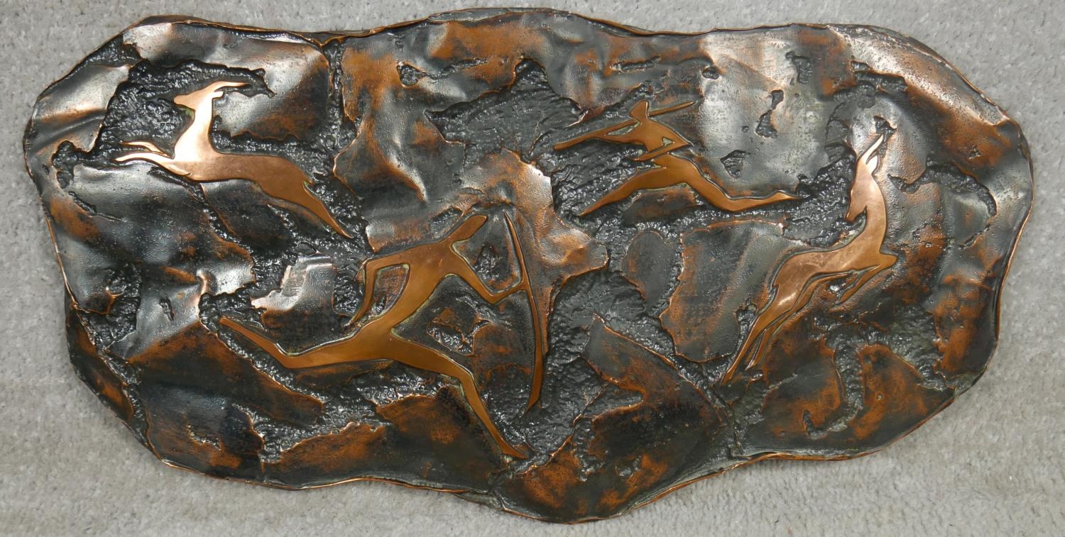 A mid-century artwork on copper. Depicting a hunting scene. H.27 W.51cm