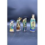 Four Chinese Sancai glazed ceramic figures of immortals in traditional robes. H.26cm