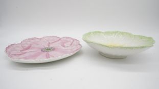 Two painted Portuguese ceramic flower plates. Makers stamp to base of one. H.7 W.24 D.24