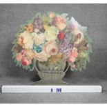 A cut out wooden screen with easel back, with decoupage flowers in a painted urn. Signed A.