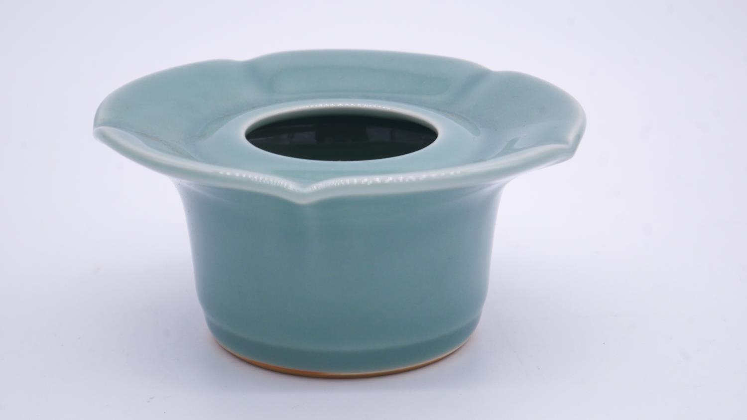 A collection of Oriental glazed ceramics. Including a celadon glaze flower form pot and set of eight - Image 4 of 7