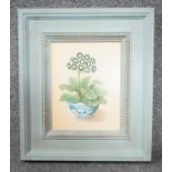 ALEXANDRA CHURCHILL - A framed oil on board still life of an Auricula in a blue and white Chinese