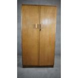 A vintage burr maple and walnut fitted compactum wardrobe. H.155 W.84 D.49