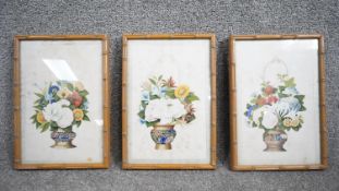 A set of three Chinese framed and glazed watercolours on rice paper of flowers in vases. H.32 W.21