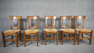 A set of five Empire style dining chairs with hand painted panels to the splats of figures in 19th