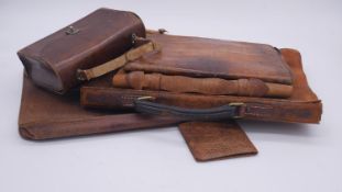 A collection of antique and vintage leather satchels, wallets and pouches. Including, python and